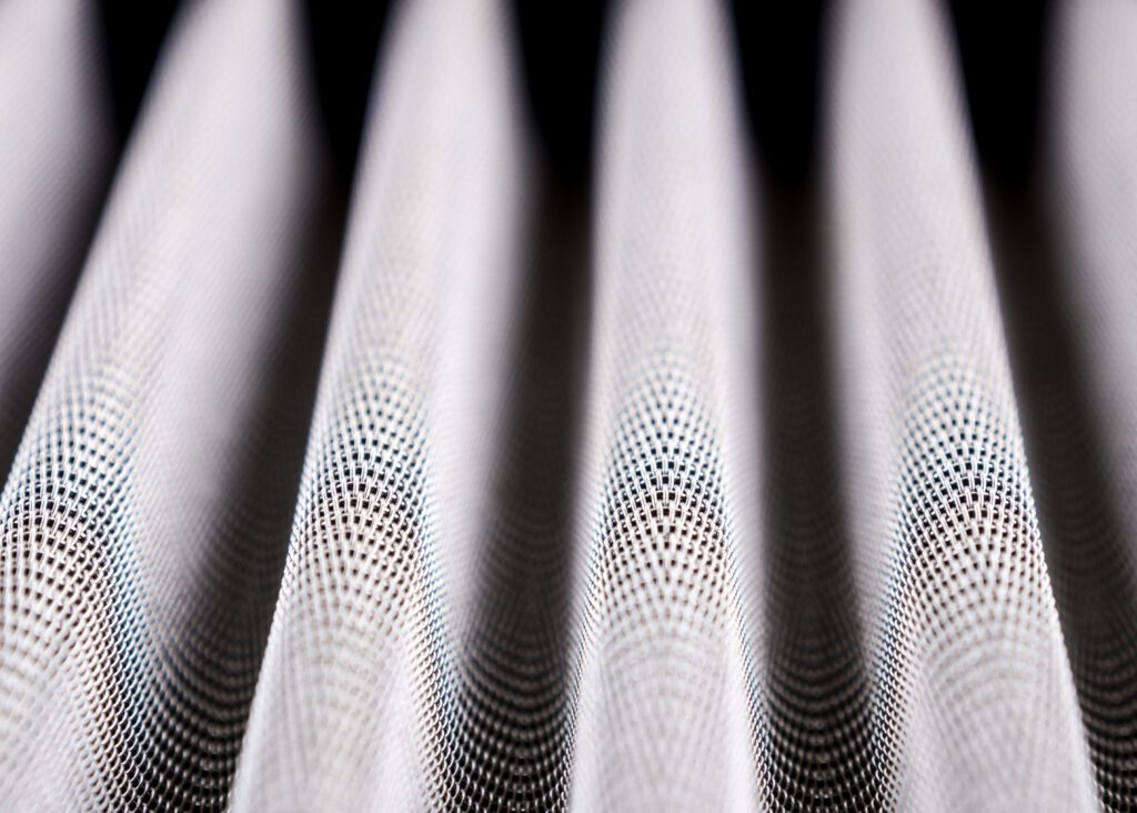 A close-up of a pleated sintered metal fiber filter.